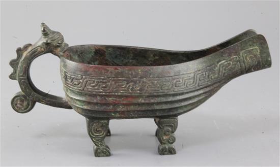 A Chinese archaic bronze ritual pouring vessel, Yi, possibly Western Zhou dynasty, 9th-8th century B.C., 28cm long